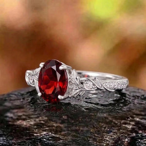 Botanical Leaf Shoulder Oval Red Garnet Engagement Ring
