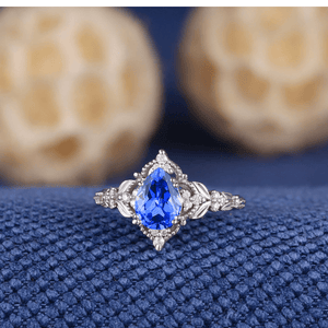 Nature Inspired Leaf Design with Tear Drop Blue Stone Black Tungsten Matching Couples Rings - anerjuly