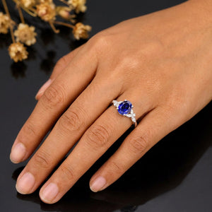 Leaf & Vine Oval Blue Sapphire Engagement Ring