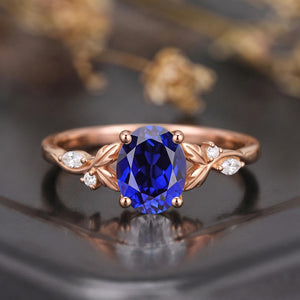 Leaf & Vine Oval Blue Sapphire Engagement Ring